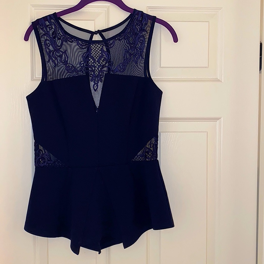 Navy color top , wear only time , used like new